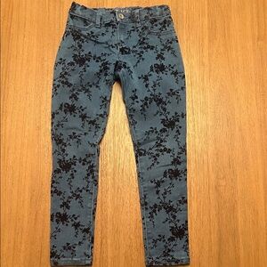 Blue Jeans with black velvet floral accents